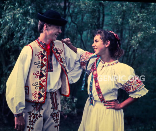 Youth in folk costumes.