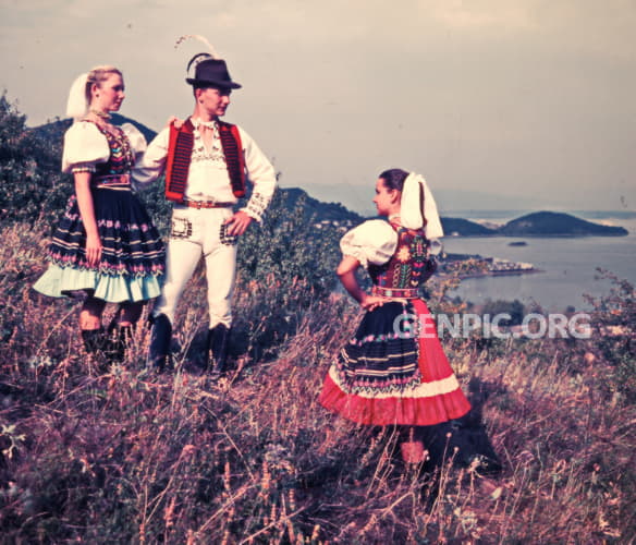 Village people in folk costumes.