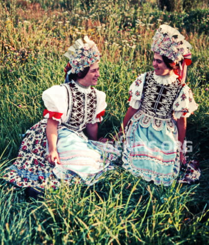 Ladies in folk costumes.